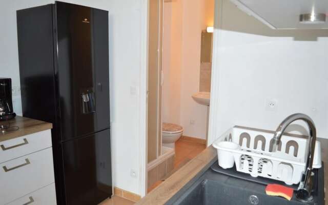 Appartement Lumineux avec Jardin Piscine