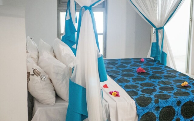 Neema Barefoot Beach House