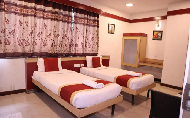 Smilestay Sri Sai ram Suites