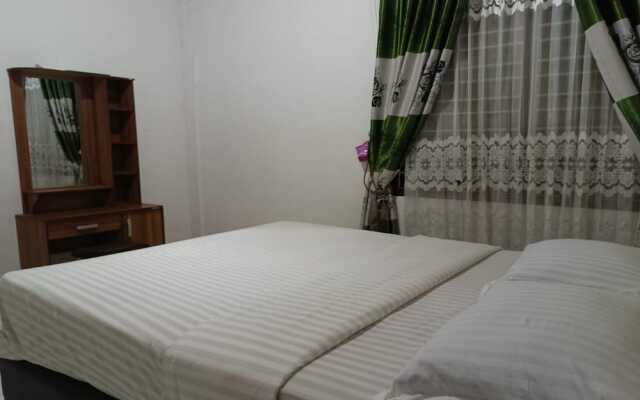 OYO 93706 Penginapan Syariah Hj. Kenan
