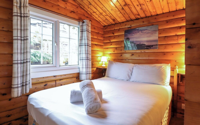 Y Bwthyn Pren, Cabin 209,