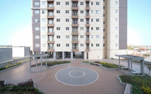 Cozy Living And Tidy 2Br At Puncak Dharmahusada Apartment