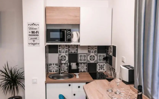 Puzzle Apartments & Studios