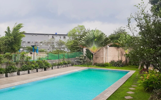 Homey and Simple 2BR at The Medina Apartment