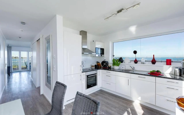 Ostseewind: Wasserblick, finnische Sauna, Whirlwanne, Kamin, 2 Parkplaetze