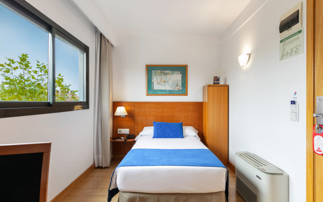 Отель Sercotel de los Reyes