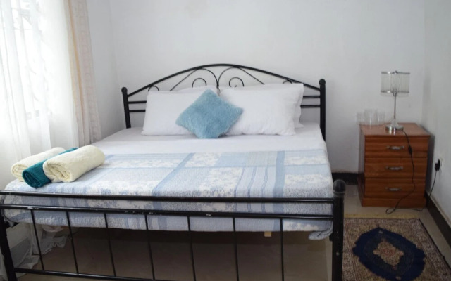Dar es Salaam-sleeps8-parking-garden-pet Friendly