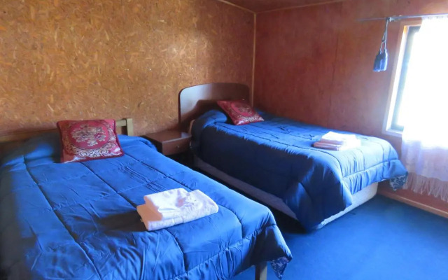 Hostal y Cabañas Perla del Lago