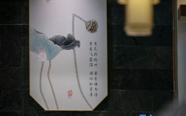 Puer Jiusi Suyuan Hotel