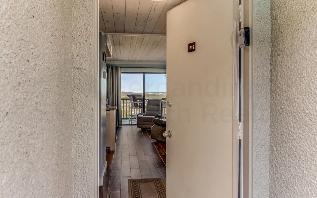Newly Remodeled Oceanfront Condo with Salt Water Pool and Private Walkway to Beach by RedAwning