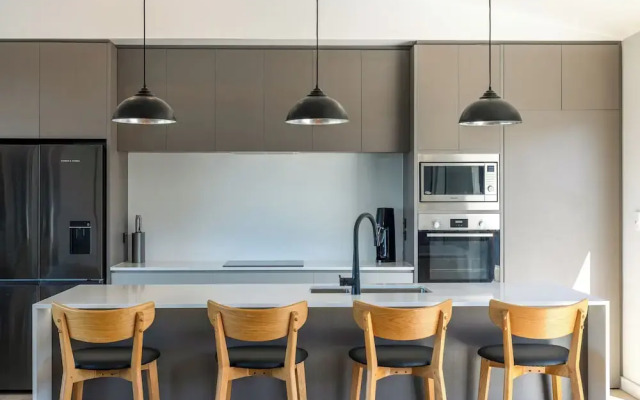 The Golden Pohutukawa Beach House