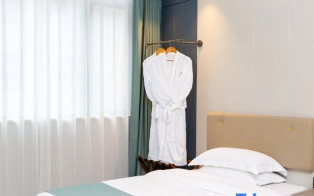 Guangmingren Wellness Hotel (Xiamen Gaoqi Airport SM Plaza)