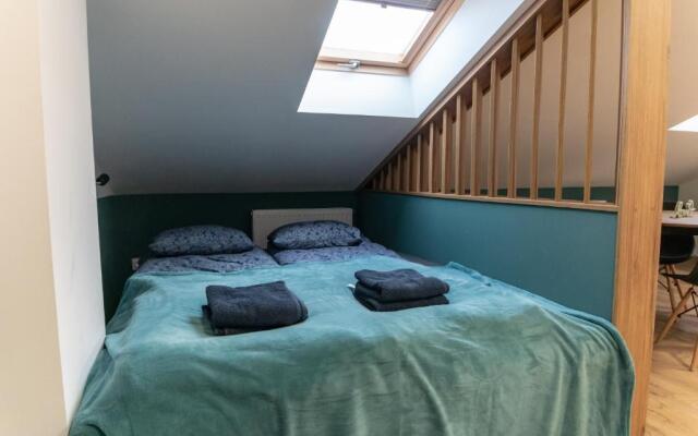 Uroczy, przytulny apartament poddasze