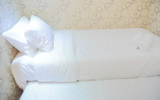 Homey and Relaxing 2BR Green Pramuka Apartment