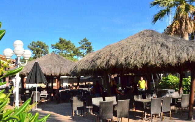 Cozy Mobile Home With Covered Terrace on a Luxury Campsite