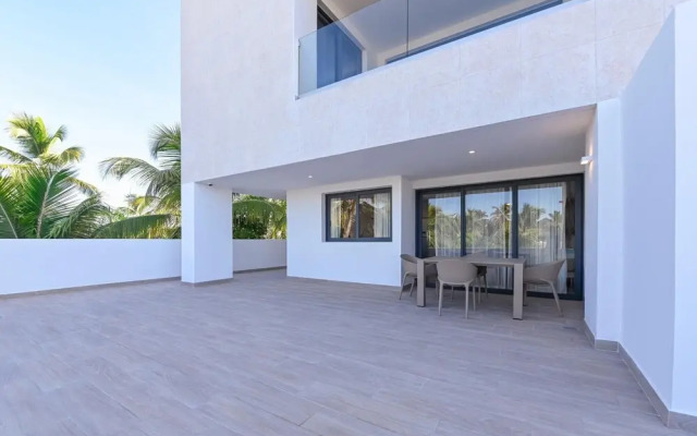 Beach Vacation at This Modern Apartment