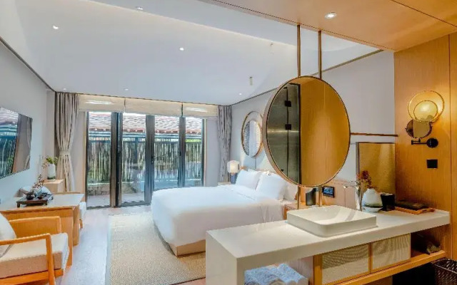 Blossom Hill Hotel Qingdao Aduohuayu