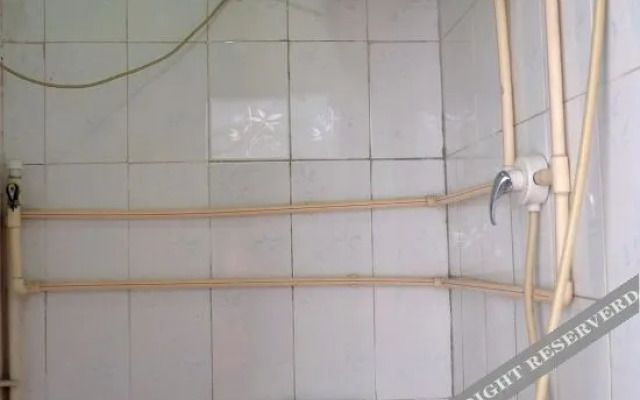 Shihe Business Hotel (Taishan Railway Station Tai'an Bus Terminal)