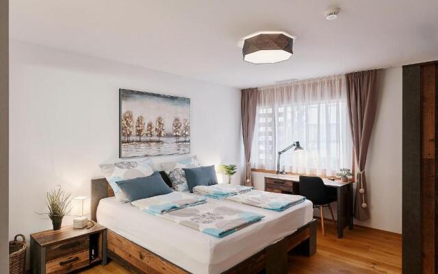 Luxus Neubau 5 min zu Talstation & Caumasee