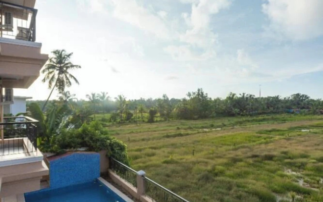 Palm Retreat 1BHK Pool & Field Views