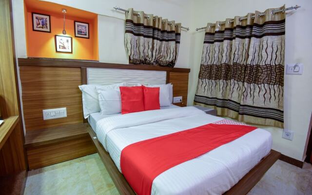 OYO 13553 Palm Residency