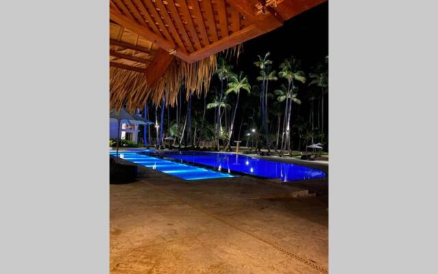 Apartment on the beach with pool and restaurant