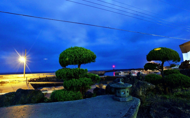 Windmill and Sea Pension