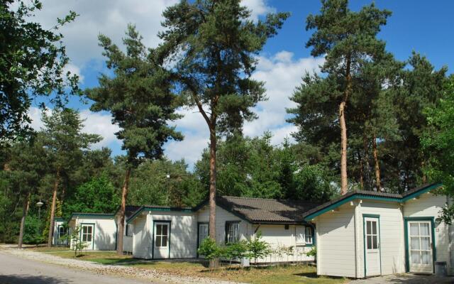 Well-furnished chalet with terrace near a recreational lake