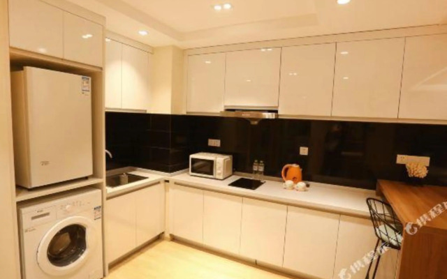 Qingdao Sihai Jiuzhou Hotel (Wuyue Plaza pengpaidao store)