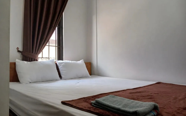 SPOT ON 92515 Timoti Guest House