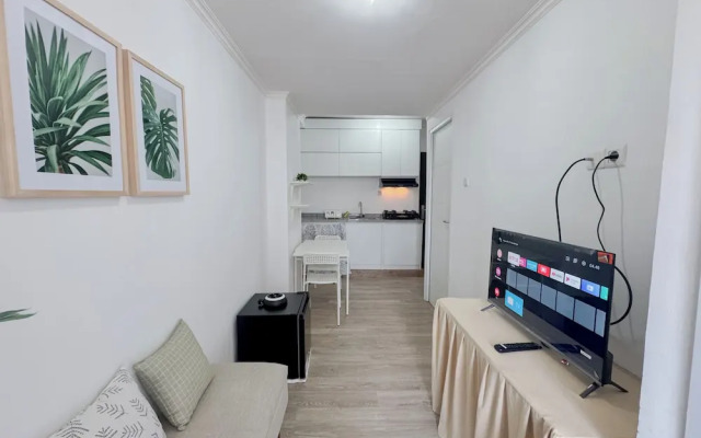Compact and Restful 2BR at Menara Rungkut Apartment