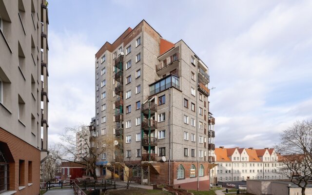 Grey Apartment in Katowice by Renters