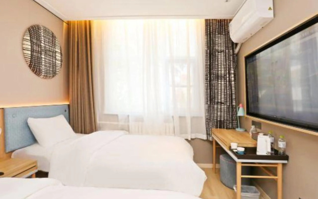 Home Inn (Weihai Kunming Road Tourist Dock Weigao Plaza)