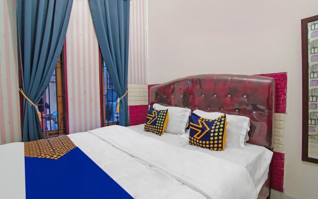 SPOT ON 92570 Putri Guest House Syariah Near SPBU Rimbo Panjang