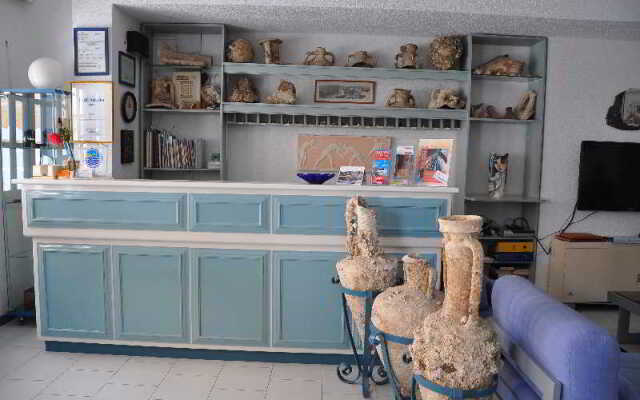 Remezzo Hotel & Studios