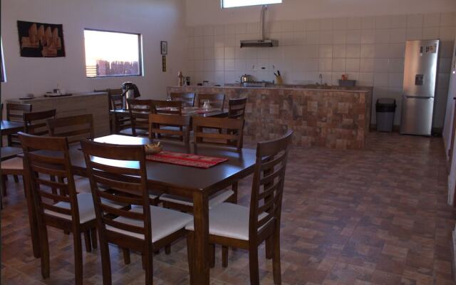 Peumayen Atacama / Hostal & Cabaña
