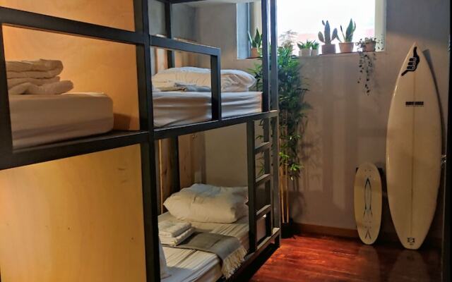 Caruma Surf Hostel & Suites