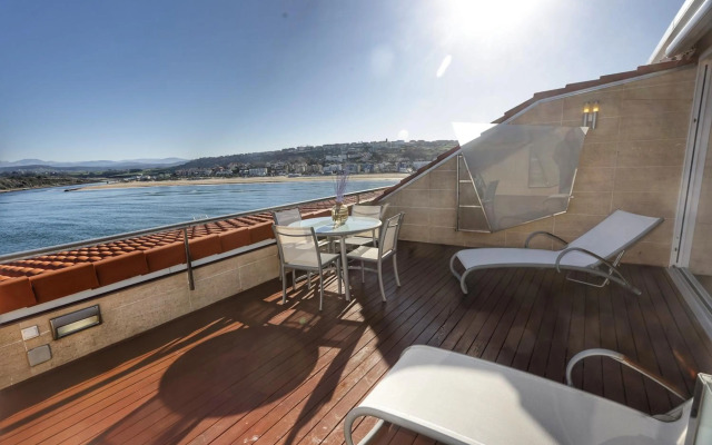 Piso sobre mar junto al Faro de Suances