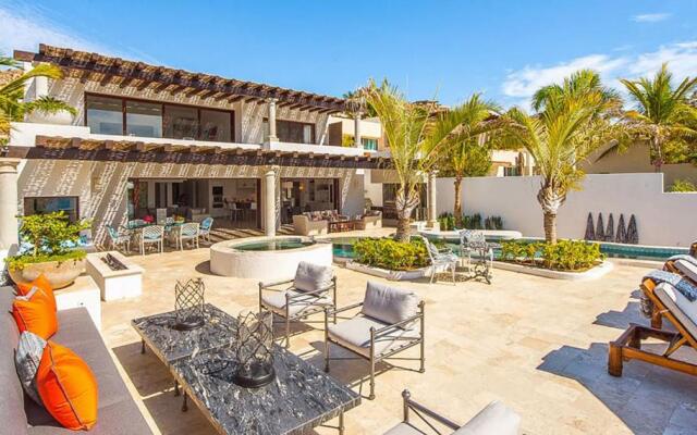 Spectacular 3-Story Beachfront Villa with a Huge Pool Patio