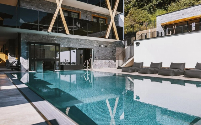 GLEMM by AvenidA Superior Hotel & Residences
