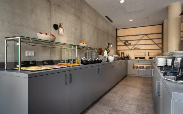 Отель Holiday Inn - the niu, Timber Esslingen, an IHG Hotel