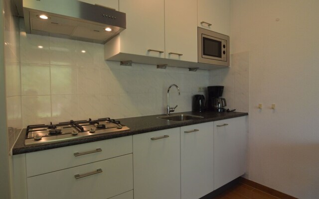 Apartment in Nieuwvliet with Roof Terrace, Garden, Parking