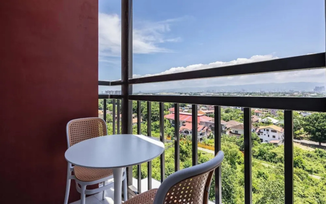 Elegant Wood-accent Studio With Balcony