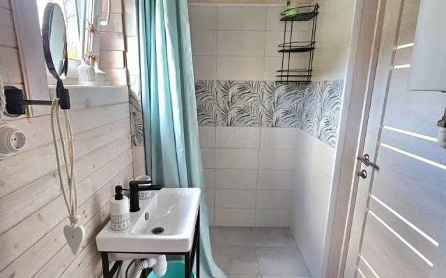 A-Frame house with a bath tub