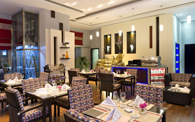 Magnum Hotel & Suites West Bay