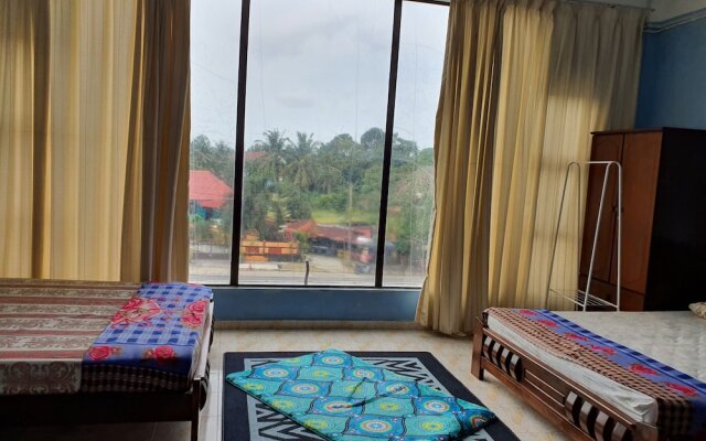 Spot On 89920 Muwaffaq Inn