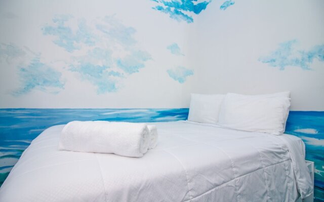The High Tide Studio #6 Studio Bedroom Hotel Room by Redawning