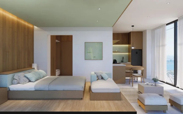Signature By M Village Beachfront Hotel