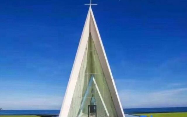 Yajing Haiju Surfing Seaview Design Hotel (Wanning Sunac Riyuewan Branch)