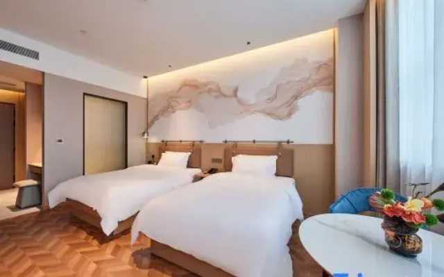 Zhoushan Liyi Jiating Zhihua Hotel (Xincheng Passenger Station)